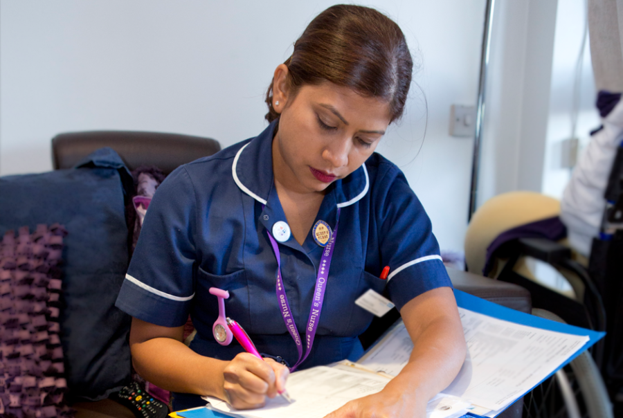 Nurse writing notes